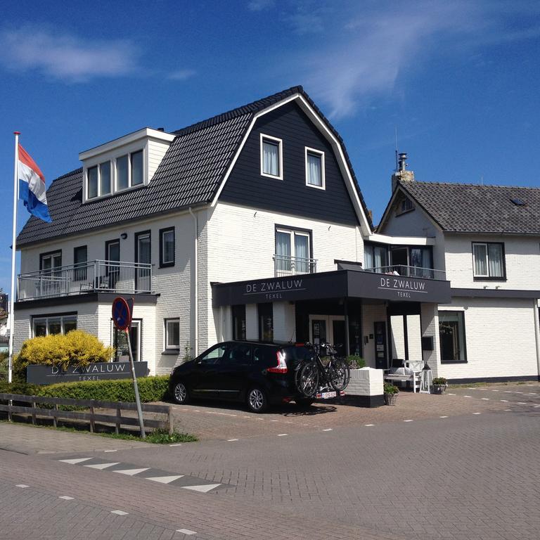 Boutique Hotel De Zwaluw De Koog  Quarto foto
